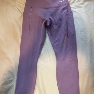 Nike women’s universa Purple Leggings